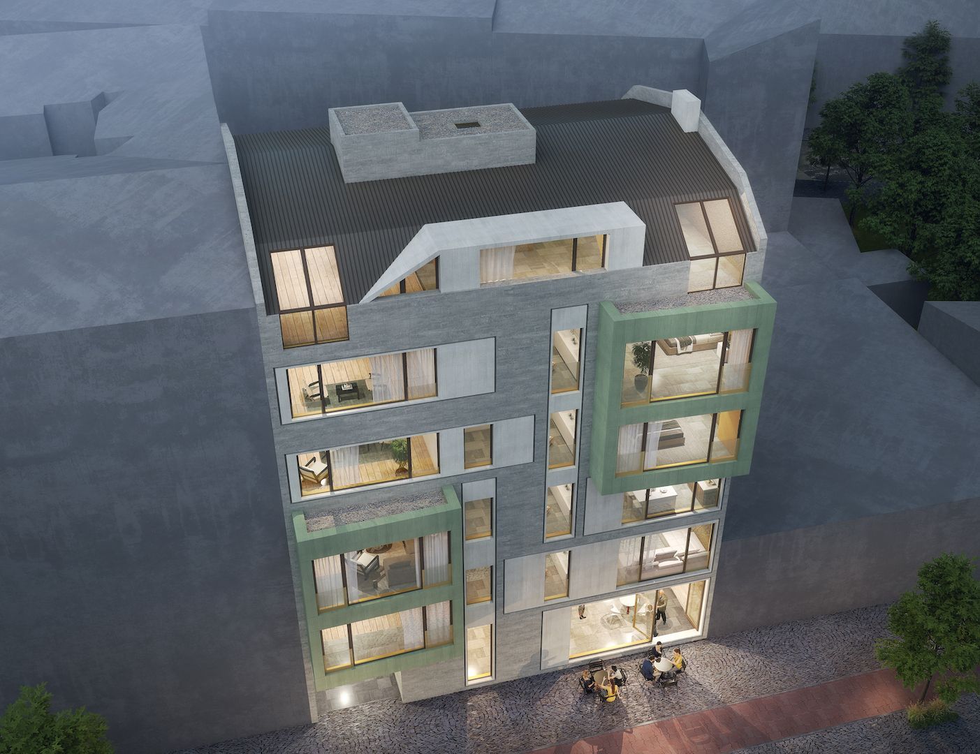 Modernes, mehrstöckiges Gebäude mit grünen Akzenten, großen Fenstern und einem schrägen Dach, das nachts beleuchtet ist.