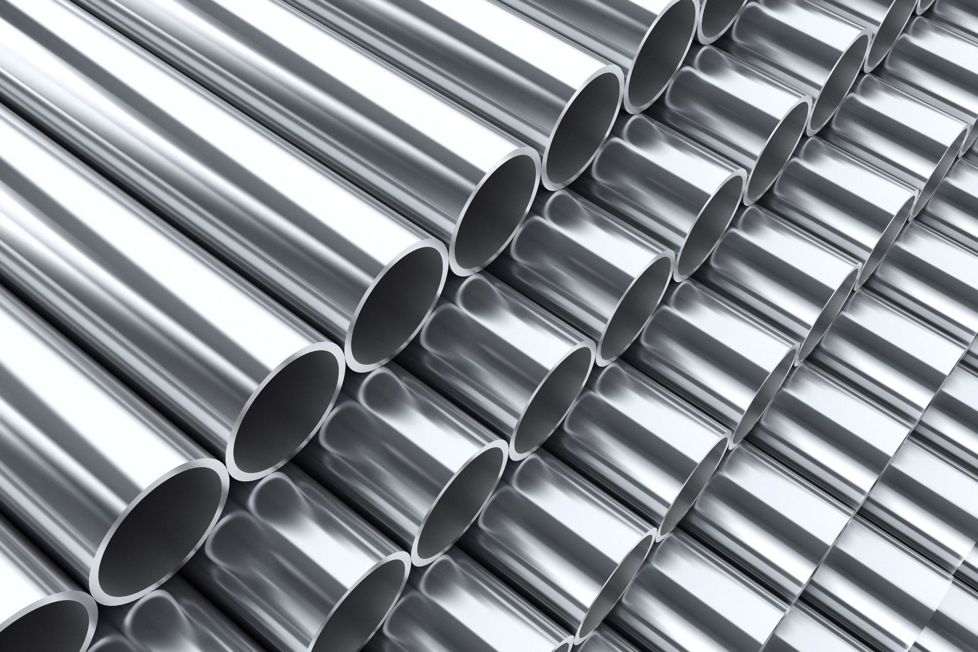 Stainless Steel Tubes Stacked On Eachother — Gladstone Sheet Metal Pty Ltd In Gladstone Central, QLD