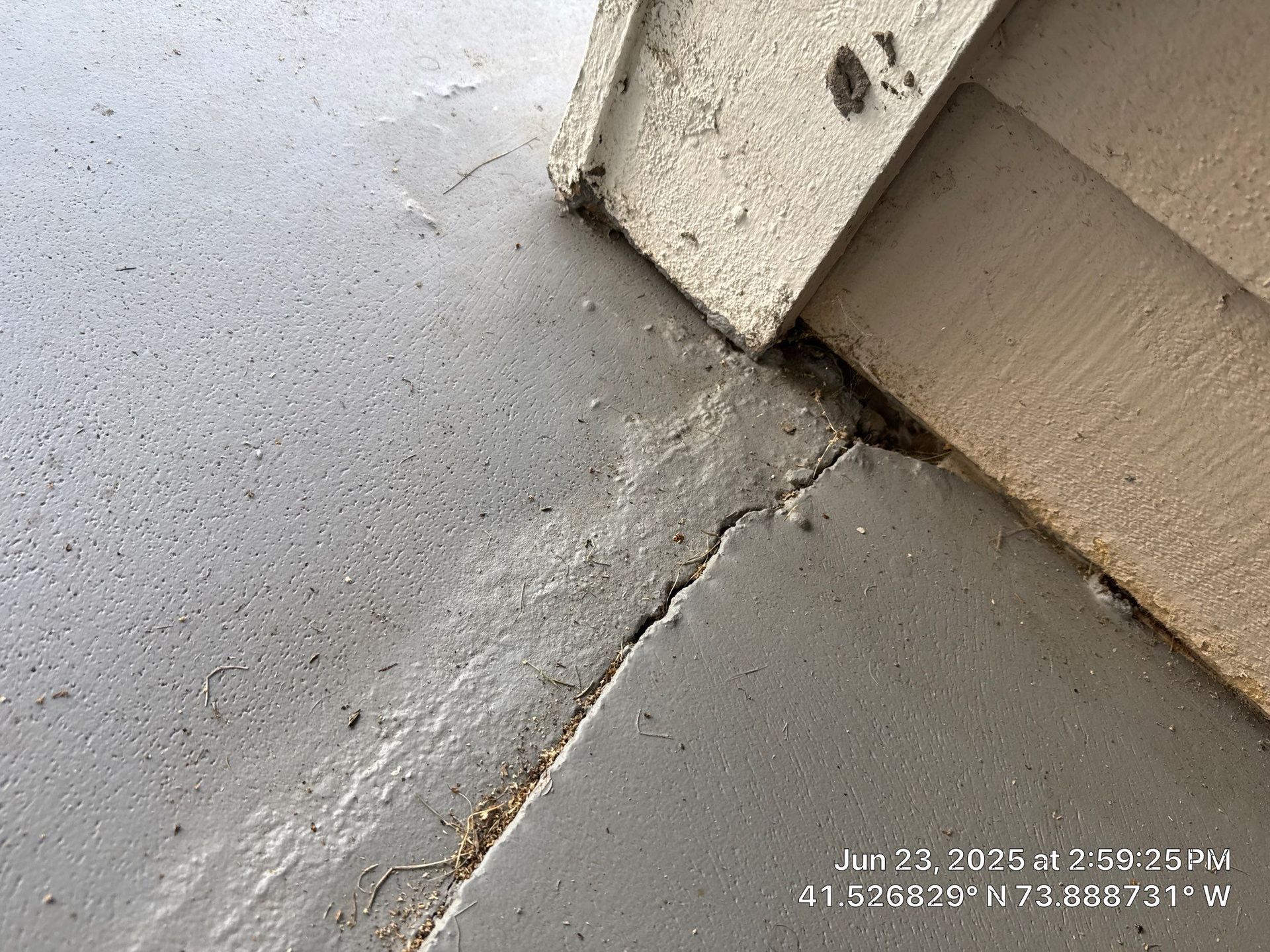 Uneven walkway before foam concrete leveling 