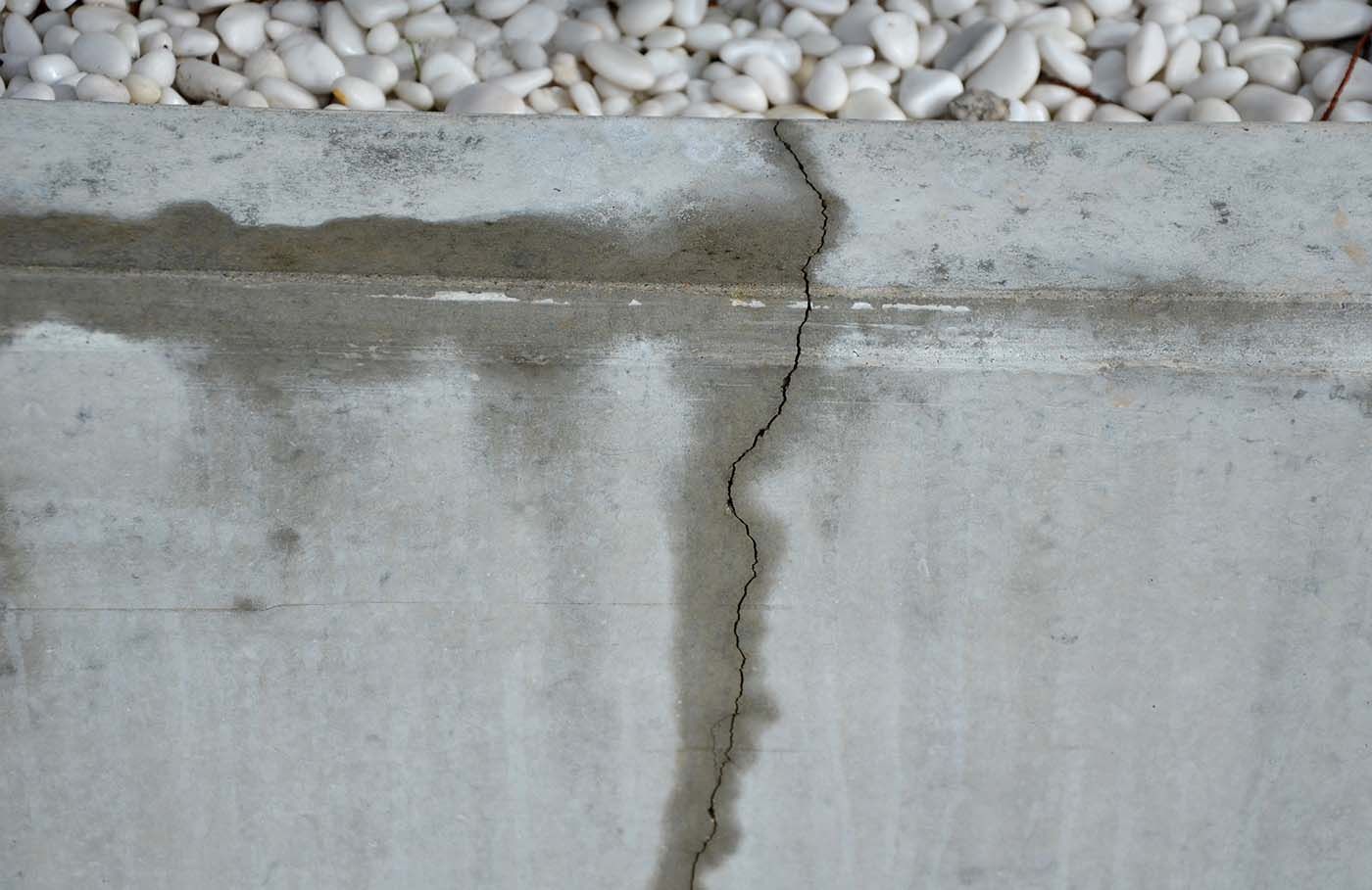 Cracked patio slab expanding in heat in New Jersey home
