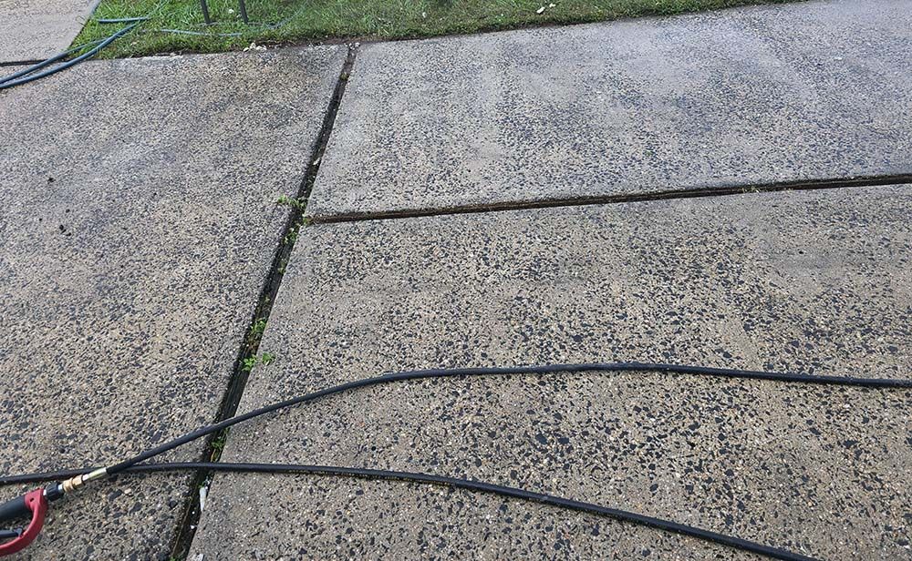 Leveled and cleaned concrete patio at a home in New Jersey. 