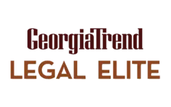 The logo for georgia trend legal elite is brown and white.