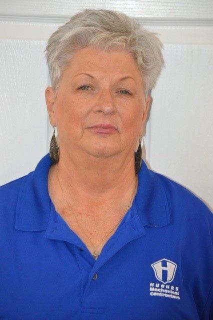 Woman in blue polo shirt, 