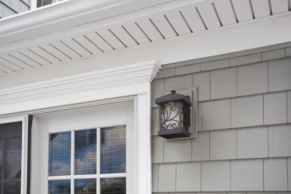 A house with a porch and a light on the side of it - Cranberry Township, PA - Dynamic Roofing Solutions LLC