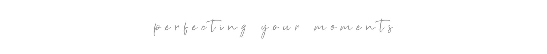 Faint handwritten text on a white background with a pale horizontal blue line