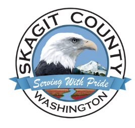 A logo for skagit county washington with an eagle