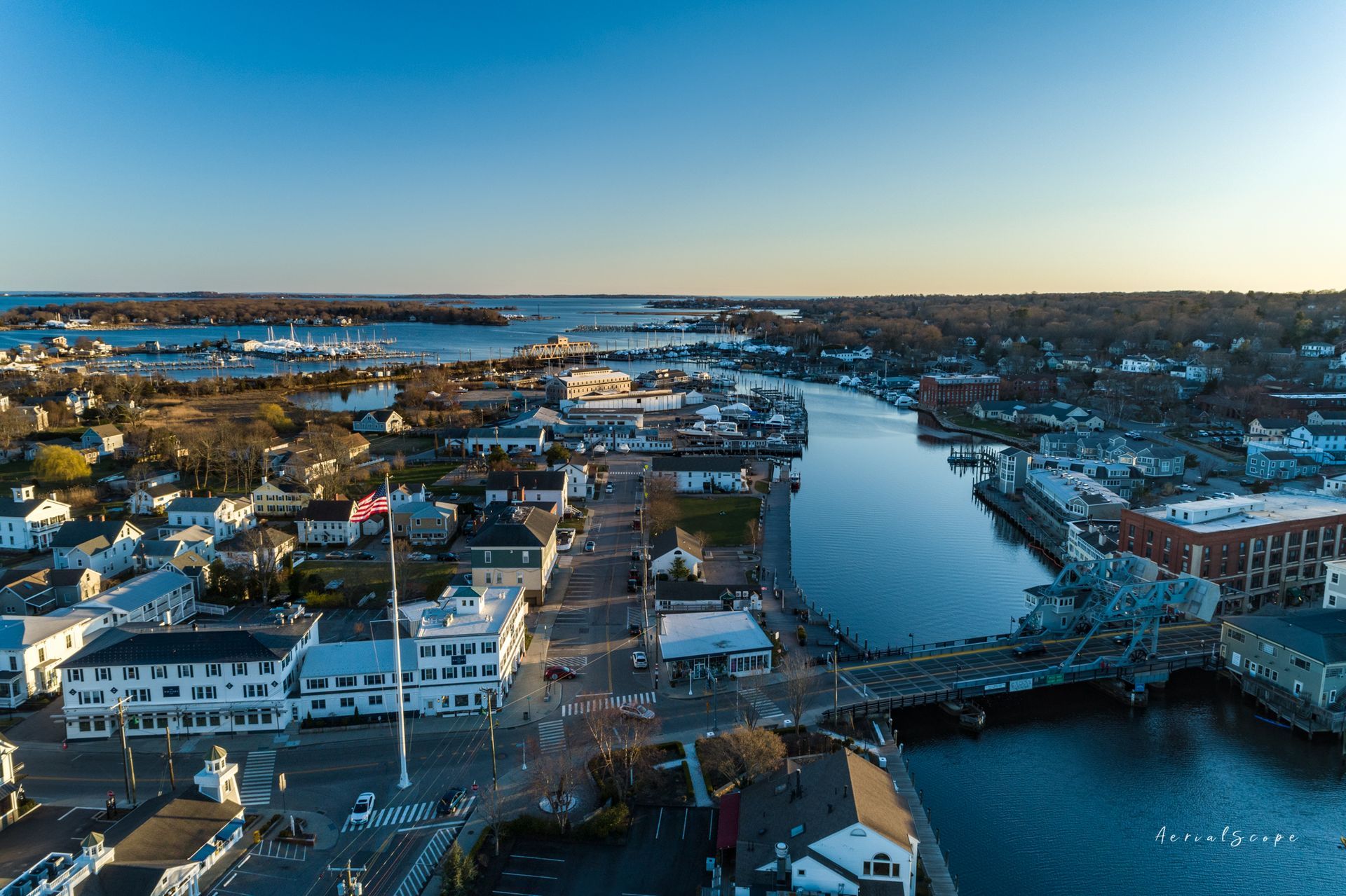 An aerial view of Mystic, CT with the Mystic River running through it.
