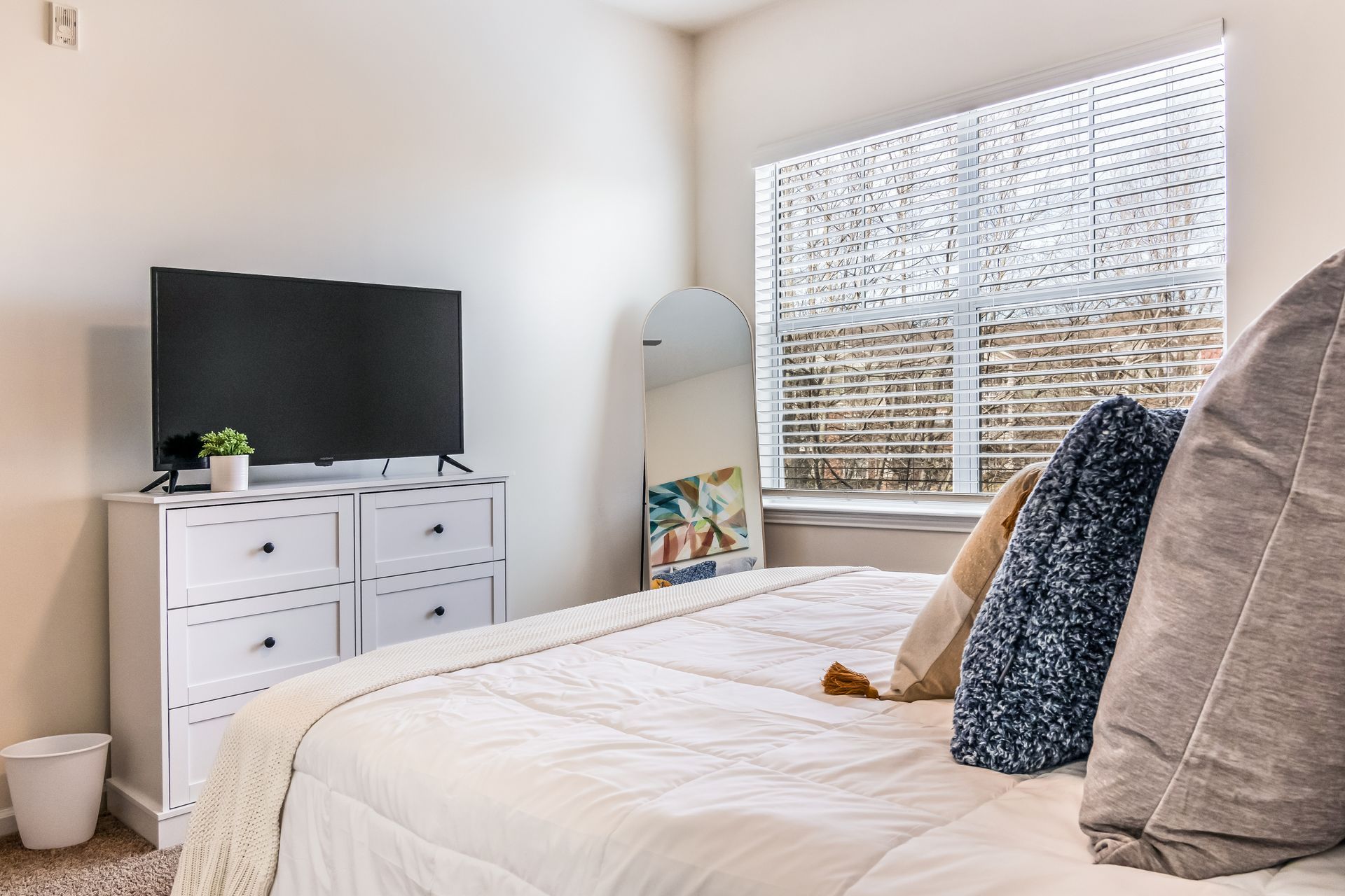 Bedroom with a large bed and a flat screen tv in Johnson City