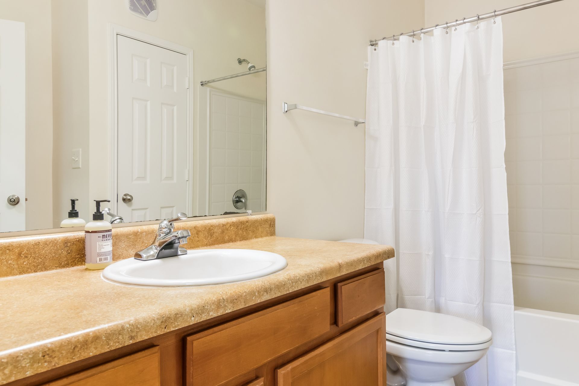 Bathroom with a sink , toilet , bathtub and mirror in Johnson City