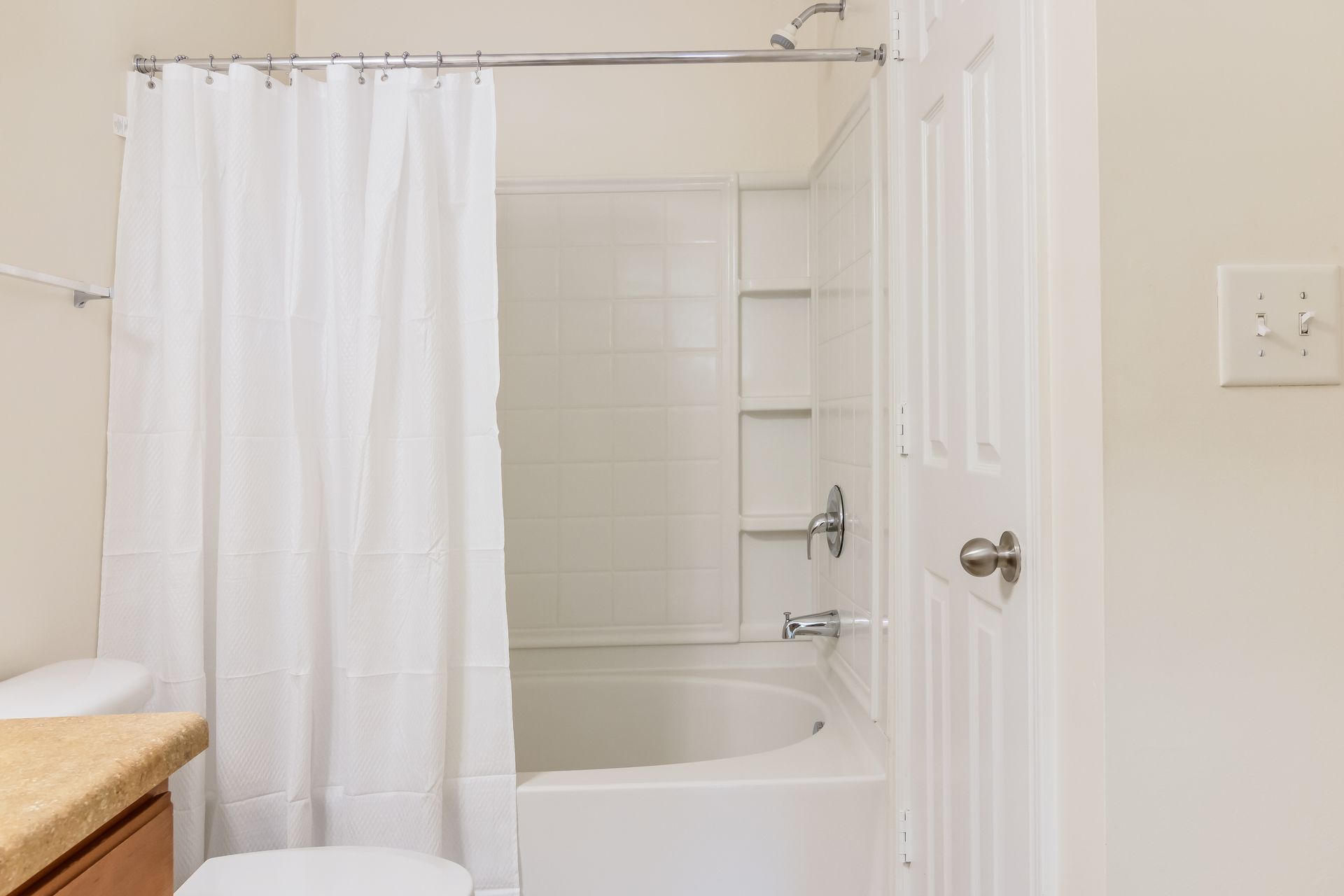 Bathroom with a toilet , bathtub and shower curtain in Johnson City