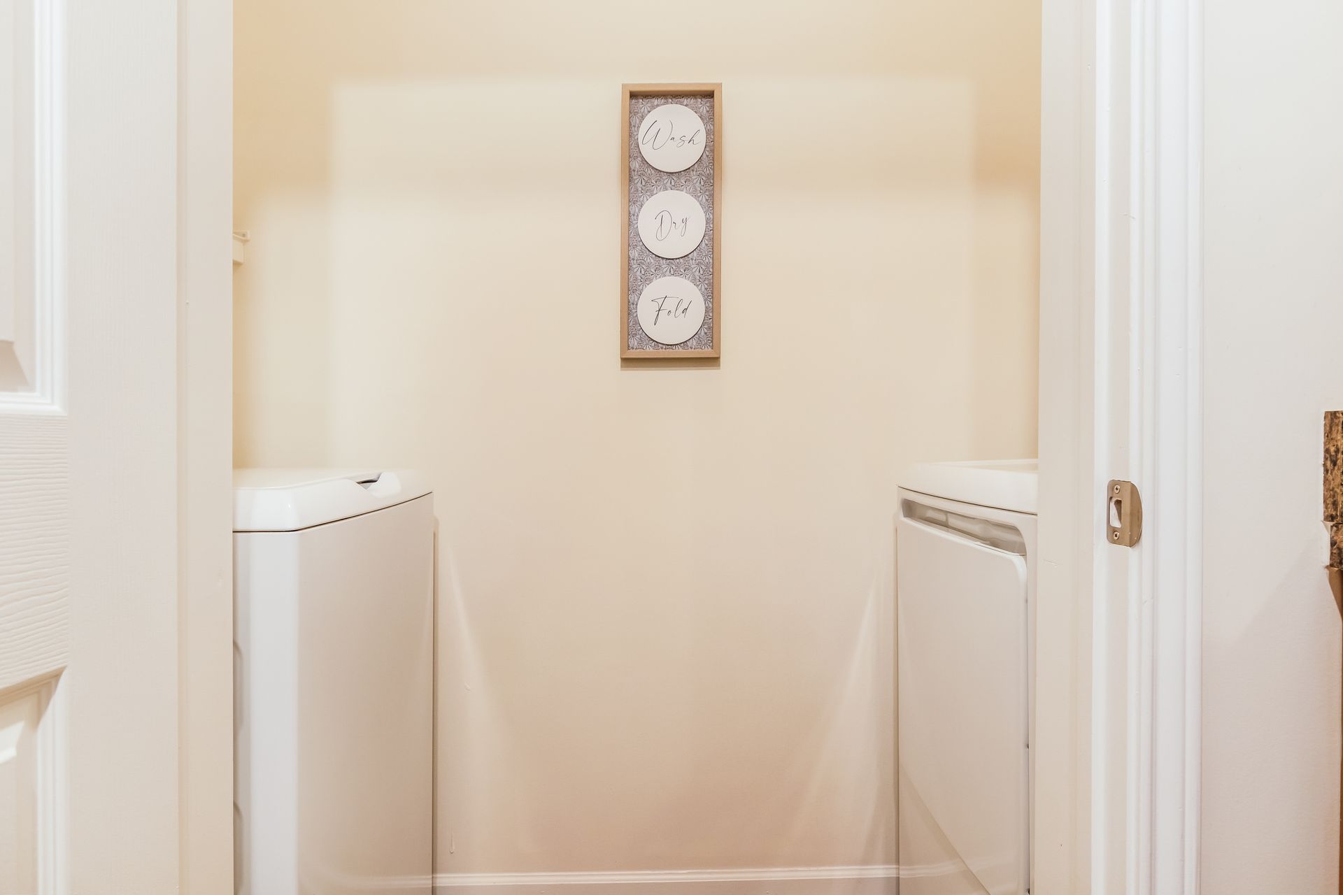 Bathroom with a toilet and a picture on the wall in Johnson City