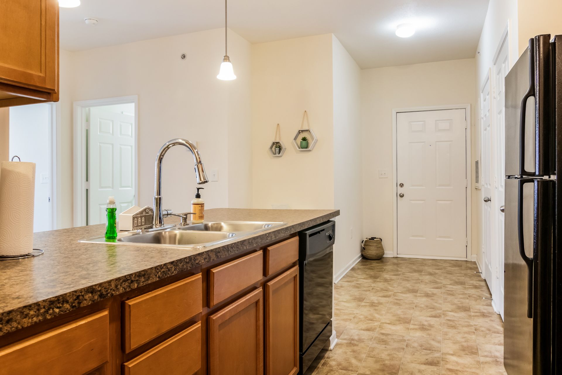 Kitchen with a sink , refrigerator , and dishwasher in Johnson City