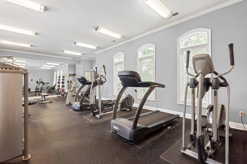 Gym with many different types of exercise equipment in this gym.