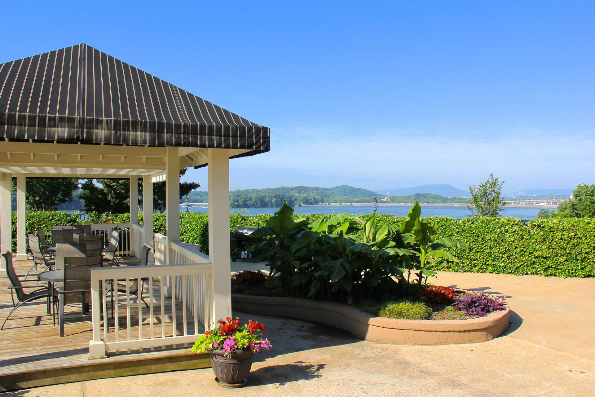 A gazebo with a view of a body of water