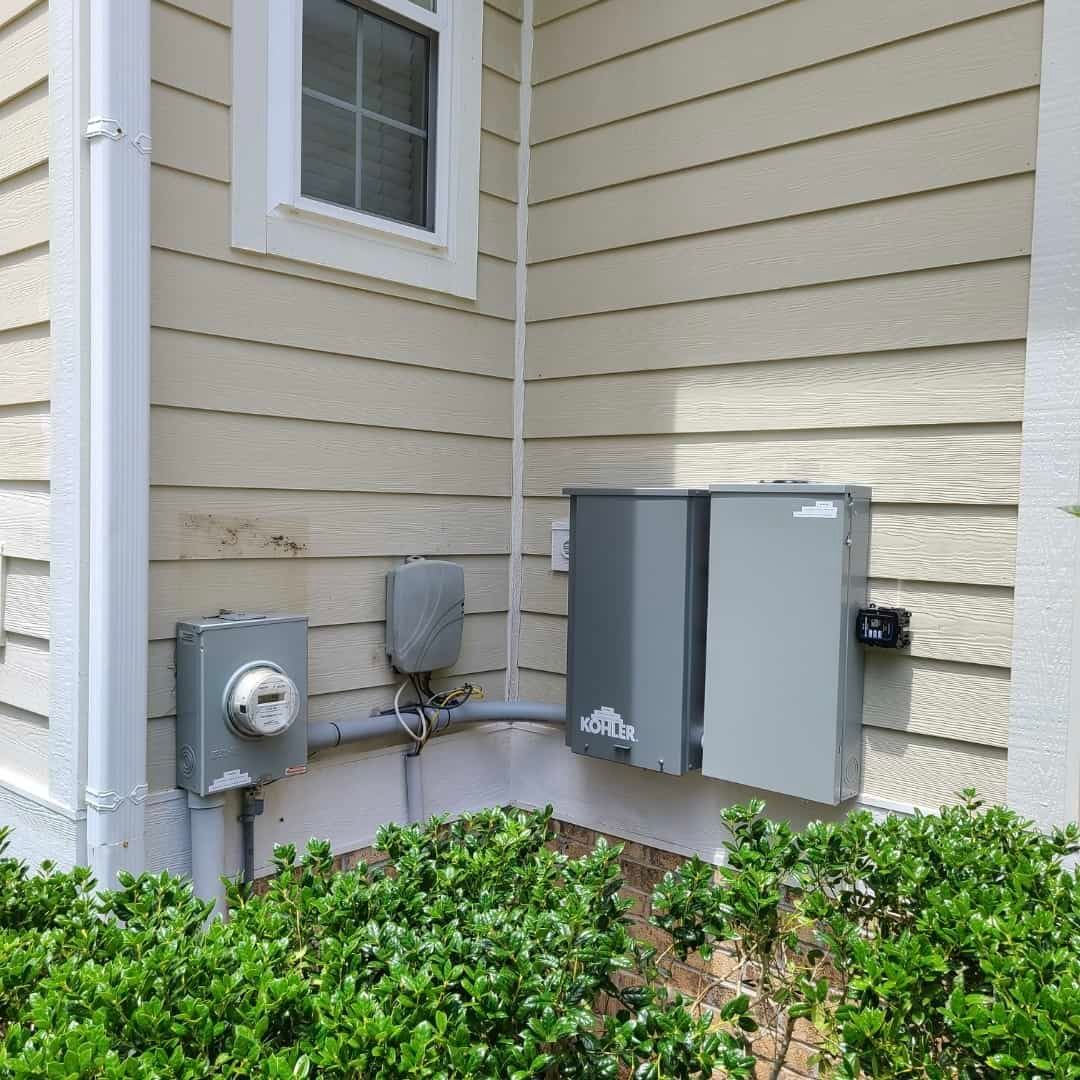 A man is painting a wall with a brush.