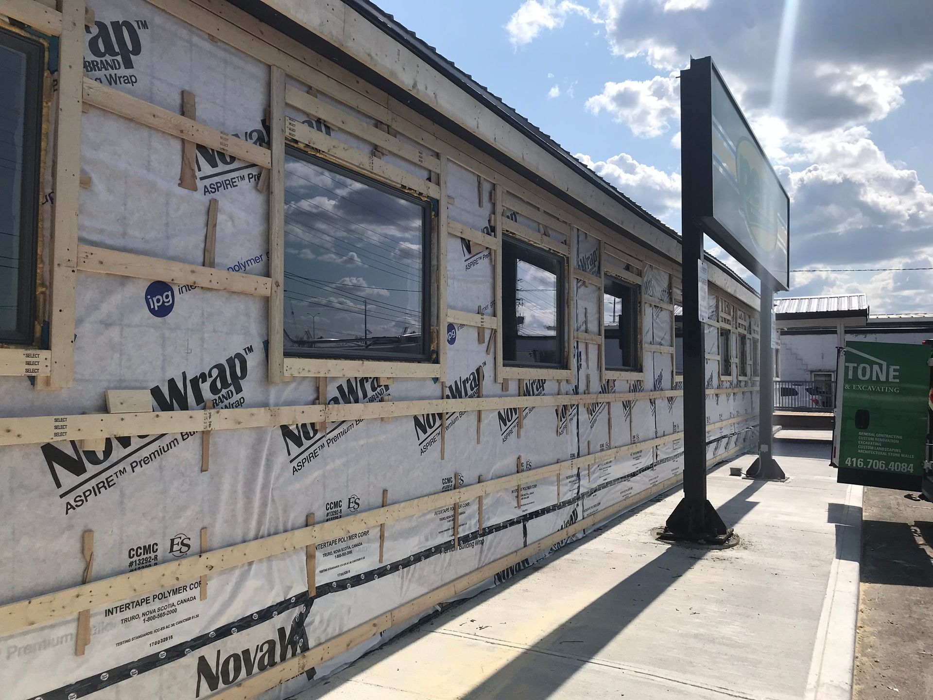 a building with a lot of windows is being built .