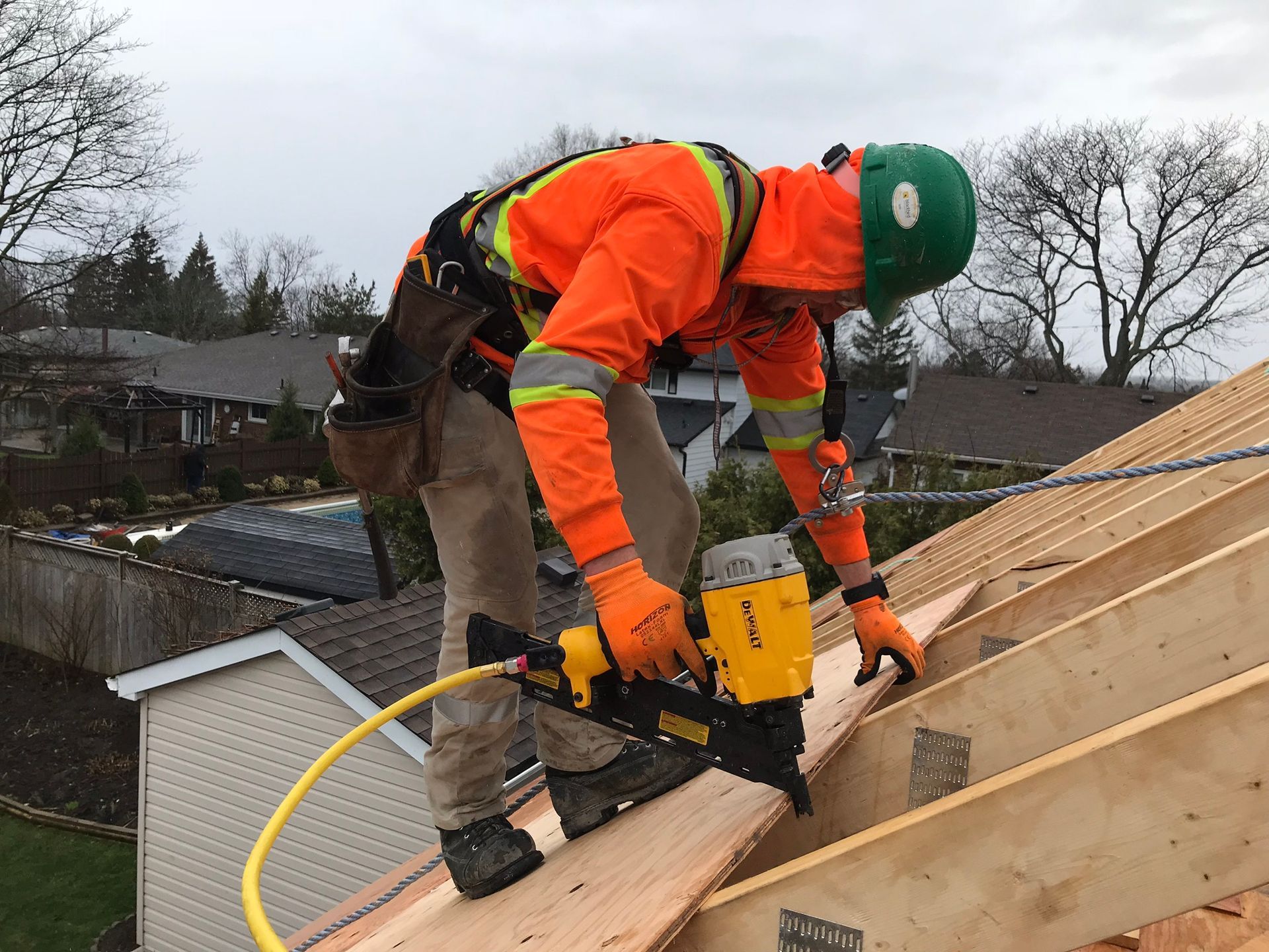 a man installing a roof