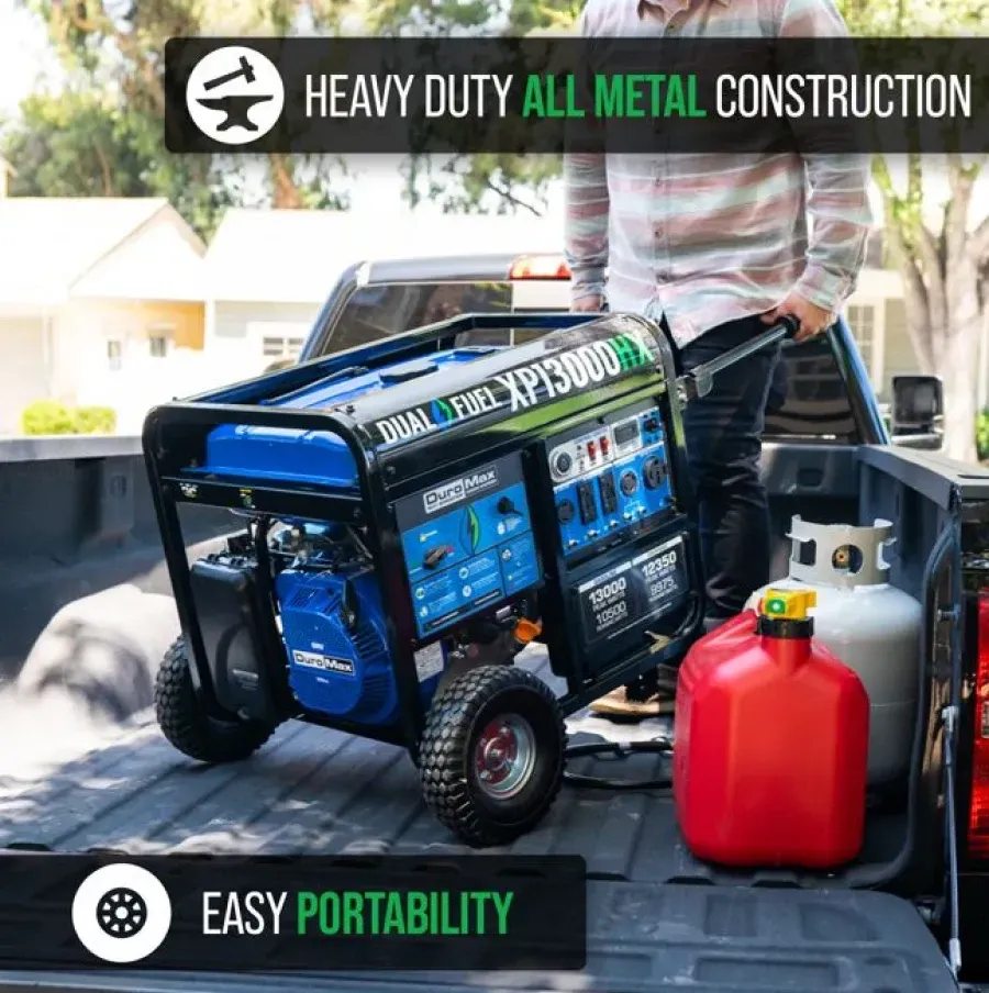 Man loading a blue dual fuel generator with wheels into a truck bed with a gas can and propane tank.