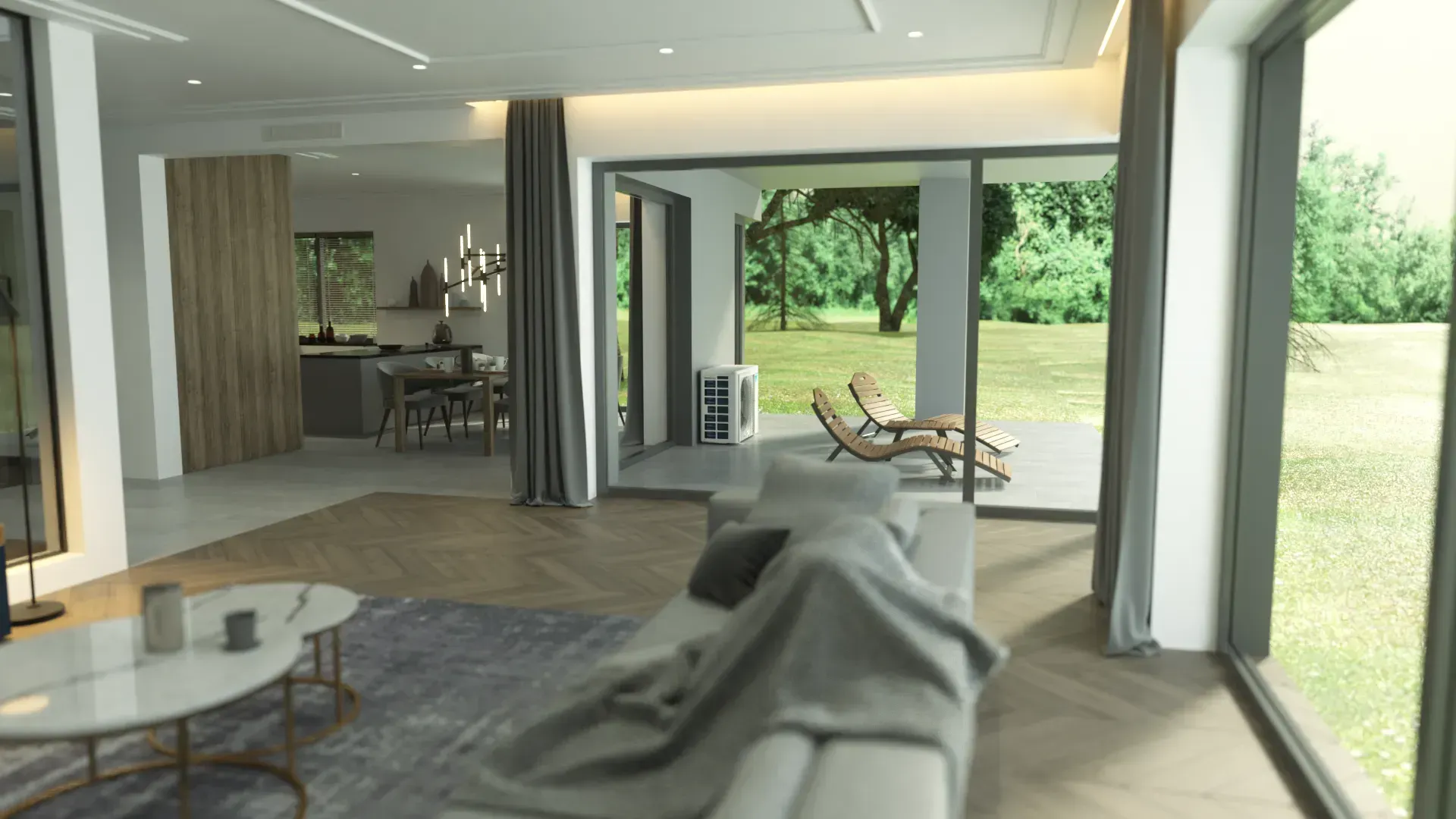 Modern living room with open layout, view of outdoor patio.  Light gray sofa, large windows, wooden floors.