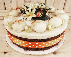 a beautiful, freshly prepared cake with floral decoration