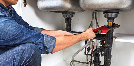 Plumber Holding Wrench — Conway, SC — Four Star Plumbing & Air Conditioning