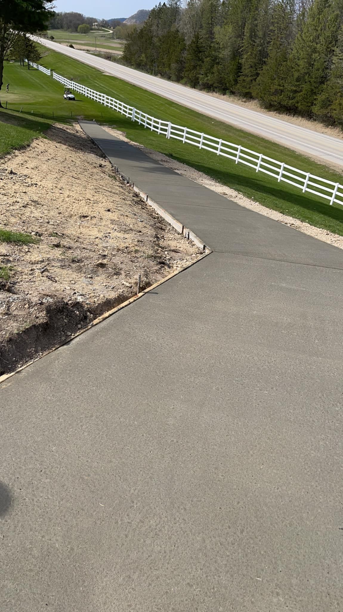 Road With A White Fence On The Side | Caledonia, MN | High Standards Concrete LLC