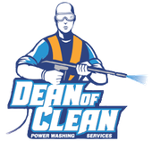 Man in safety gear with pressure washer, "Dean of Clean" logo.