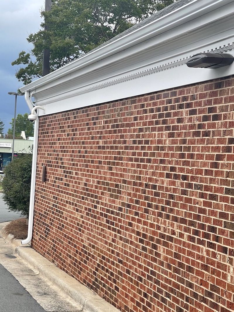 Brick House With Clean Gutter — Liberty, SC — Premier Seamless Gutters