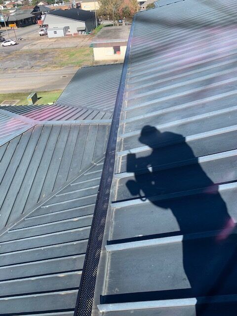Shadow Of Man In The Roof — Liberty, SC — Premier Seamless Gutters