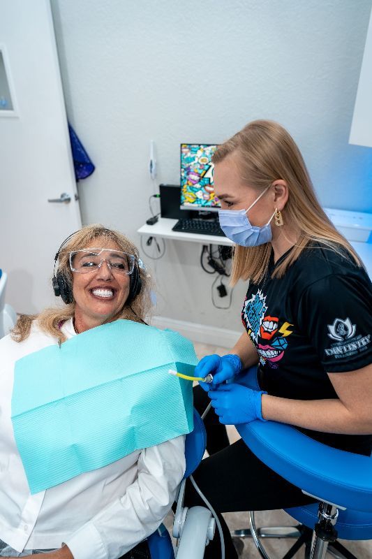 A computer generated image of a person 's mouth with dental implants.