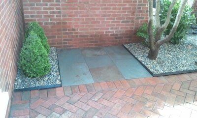 home courtyard stone path and trees — Lawn Maintenance in Princeton, NJ