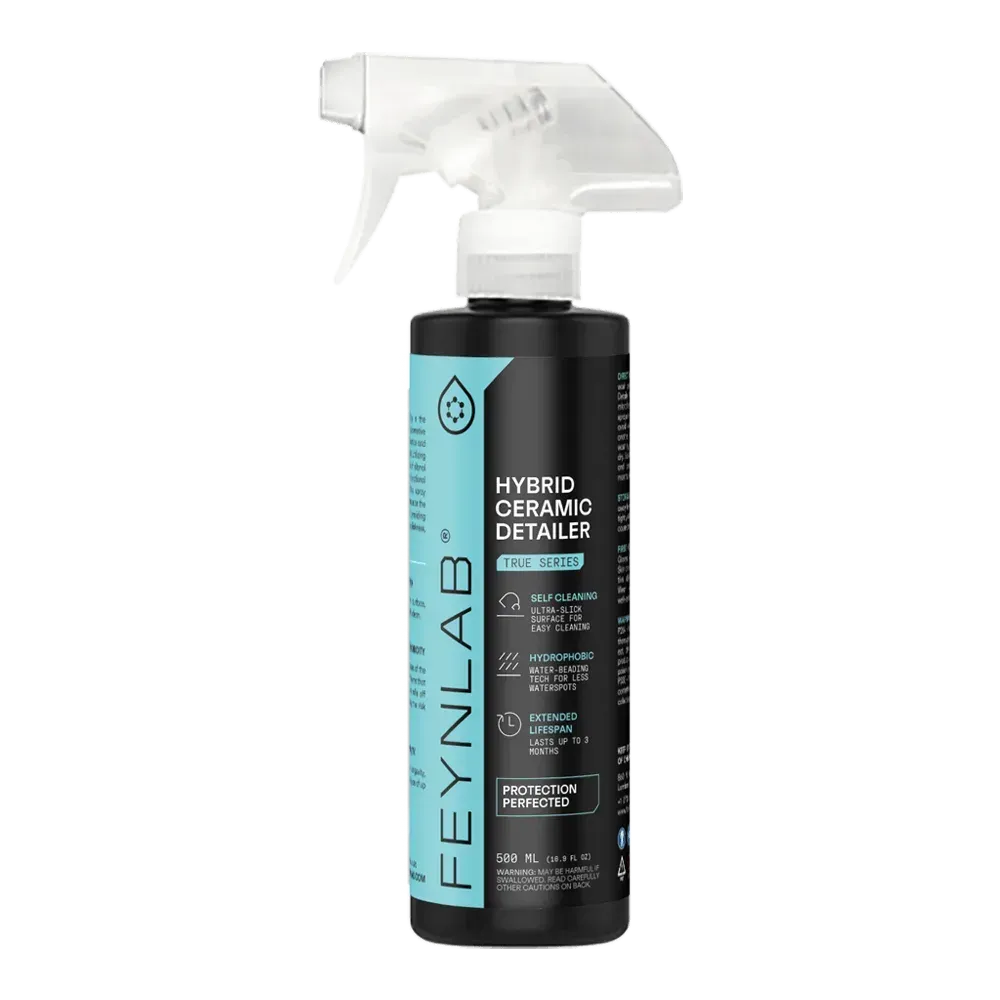 Black spray bottle labeled 