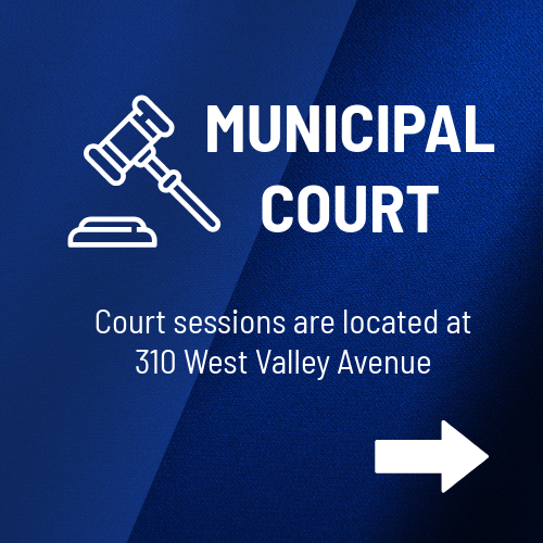 A blue sign that says municipal court john morgan is the court clerk / chief magistrate