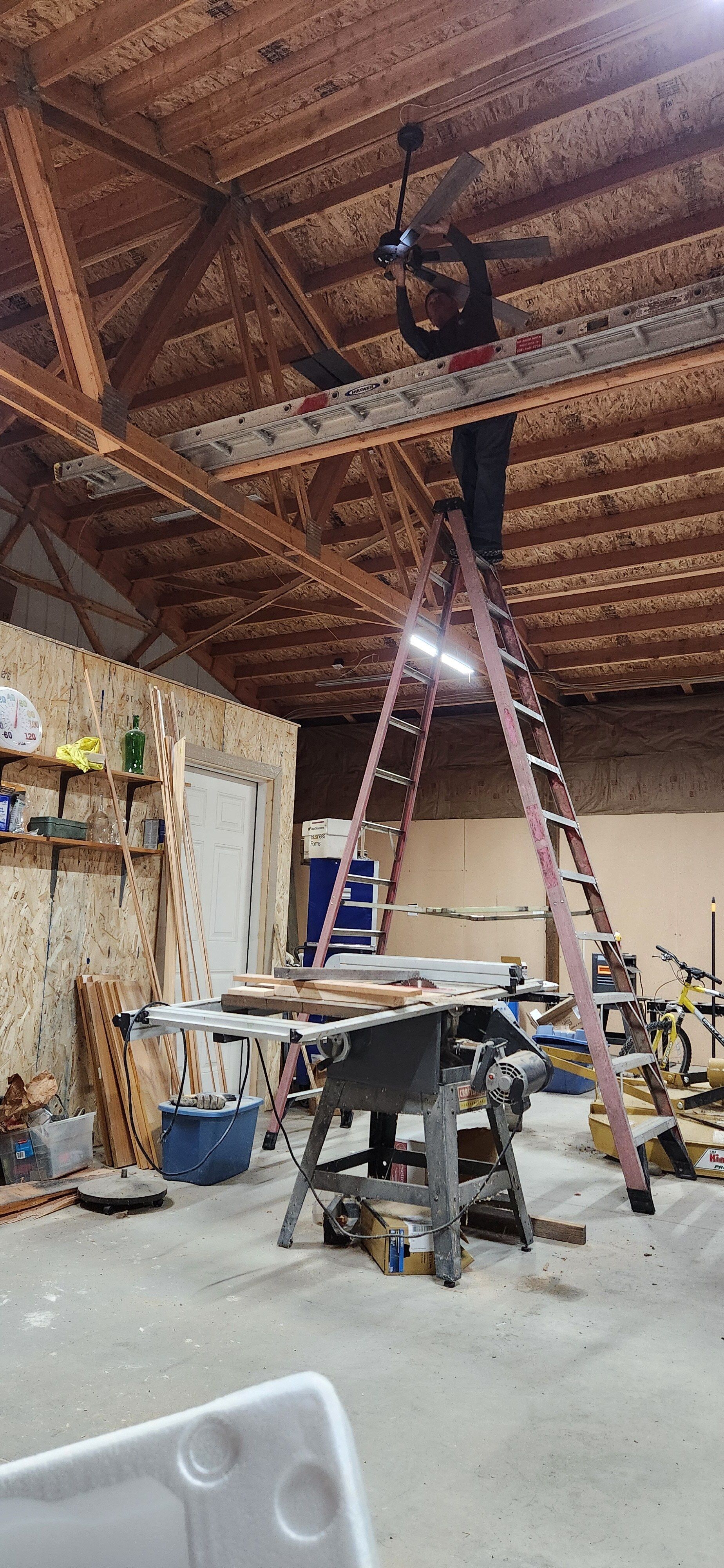 A electrical box with the door open and labels on it