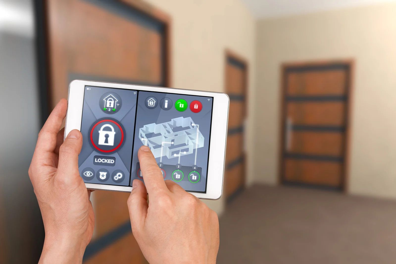 Person using a tablet to control a smart home security system with a lock button, in front of interior doors.