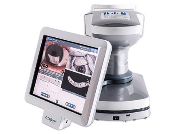 A computer monitor with a picture of an eye on it