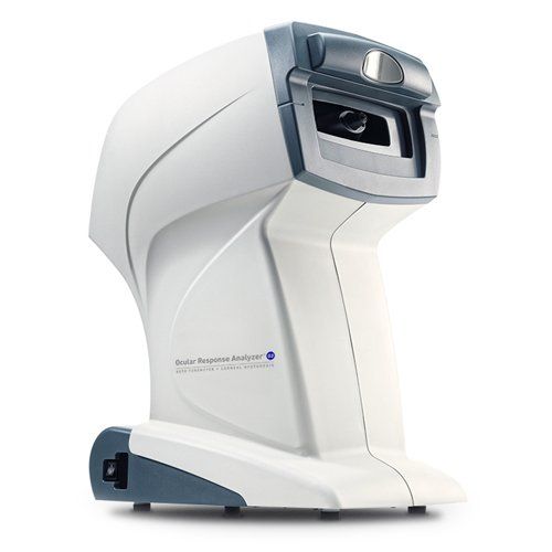 A white and blue machine with the word optical on it