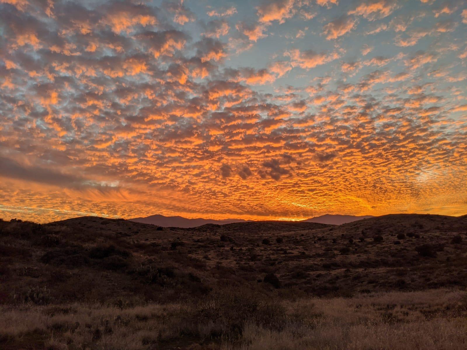 A sunset with a lot of clouds in the sky