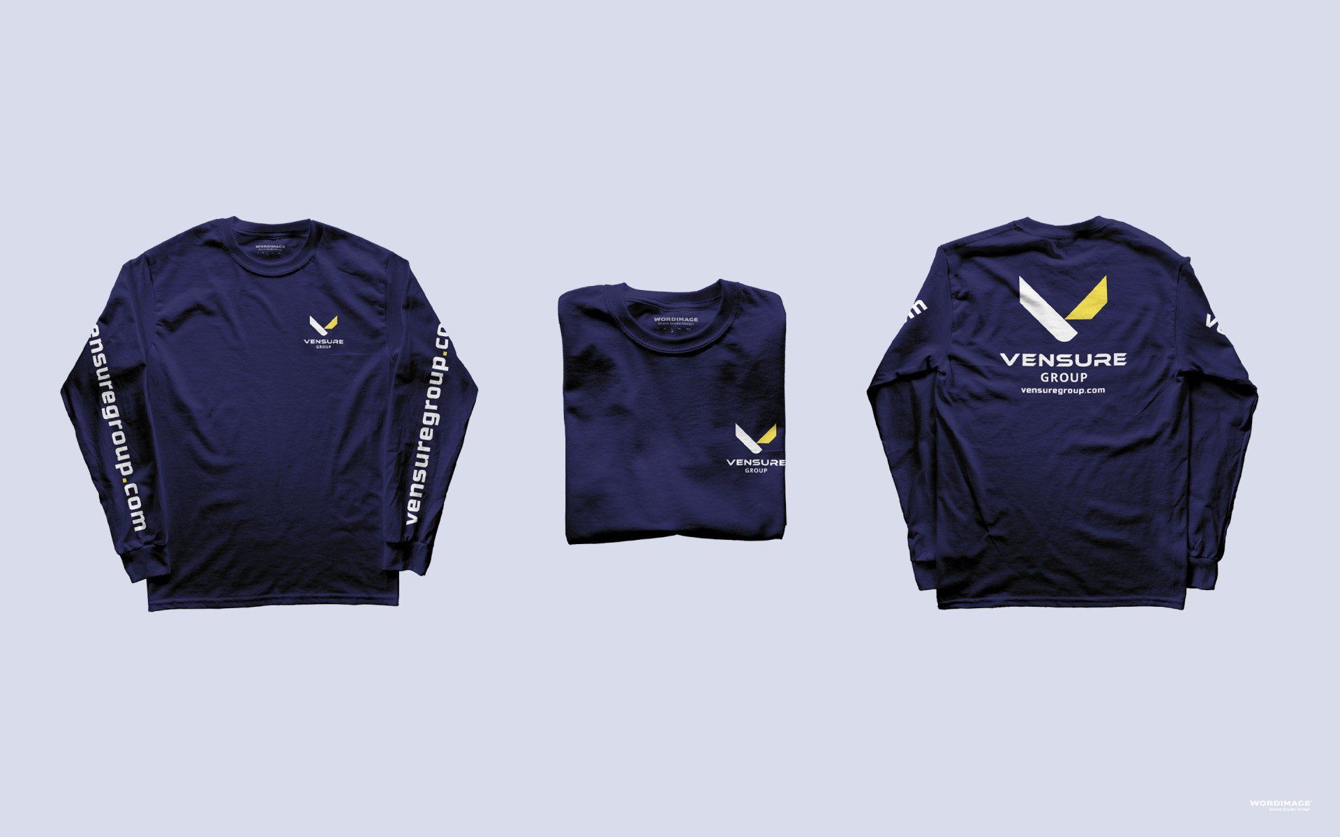 A blue long sleeve t-shirt with a yellow eagle on the front and sleeves.
