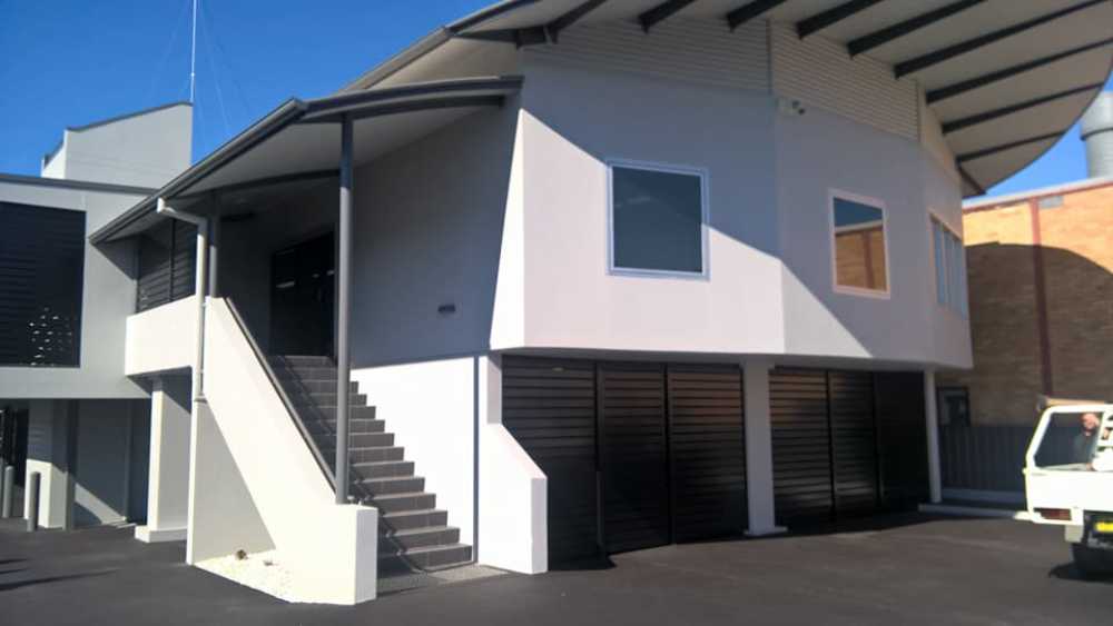 Building With Tinted Windows — Darkstyle Tinting in South Lismore, NSW