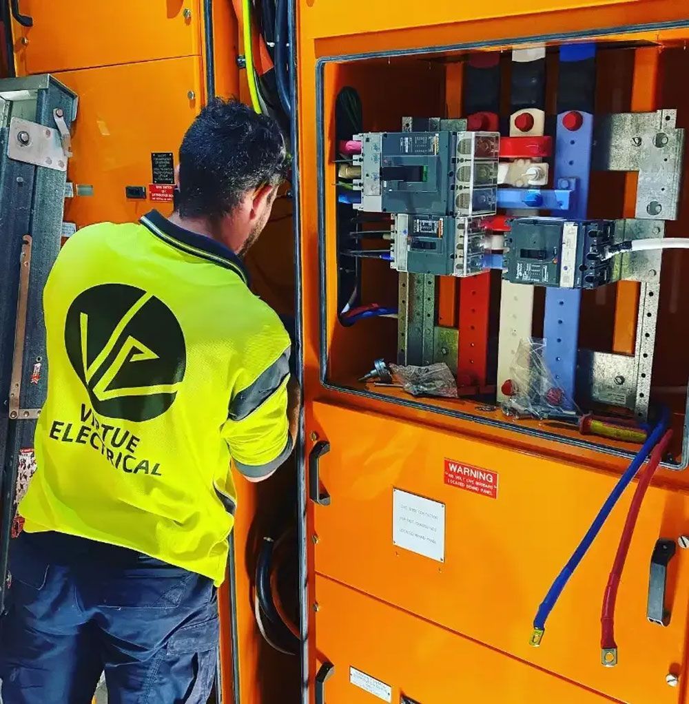 Electrician Inspecting Electrical Wirings