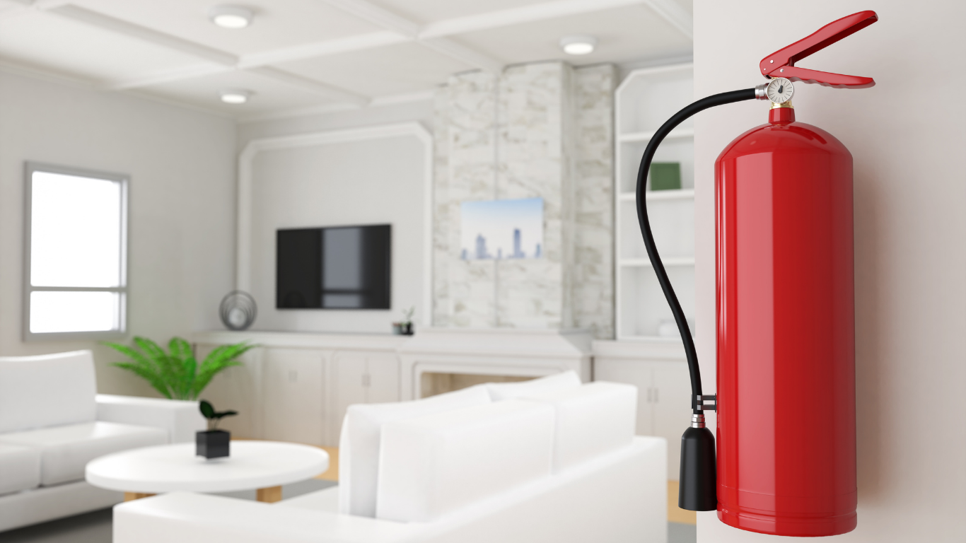Red fire extinguisher mounted on a white wall in a modern living room.