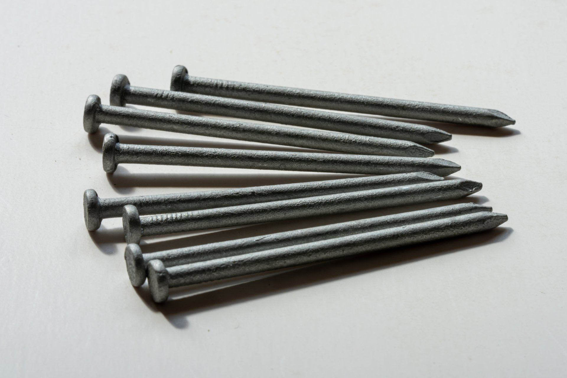 a close up of hardware nails