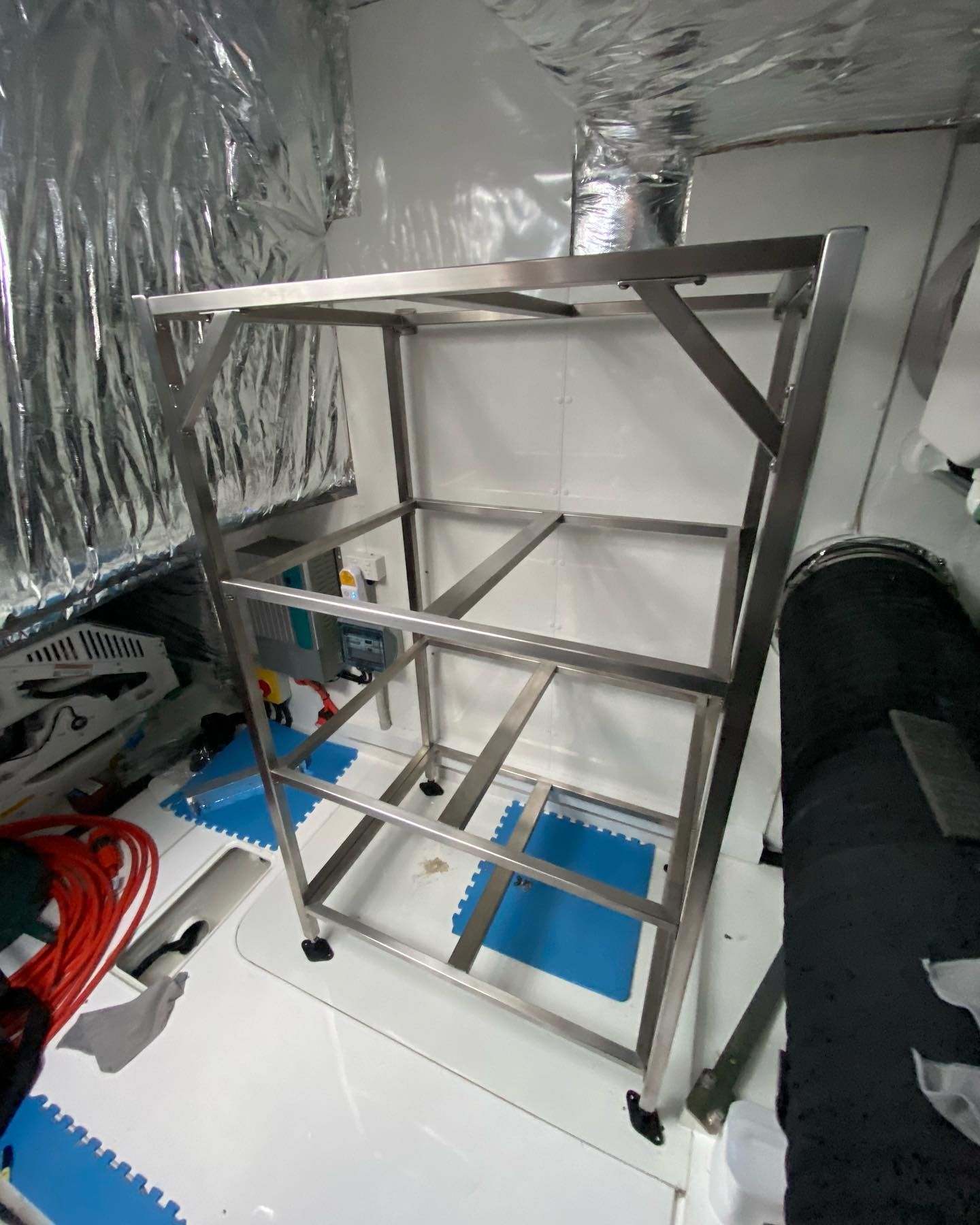 A Warehouse With a Lot of Metal Pieces on the Floor — EB Metalworks in Somersby, NSW