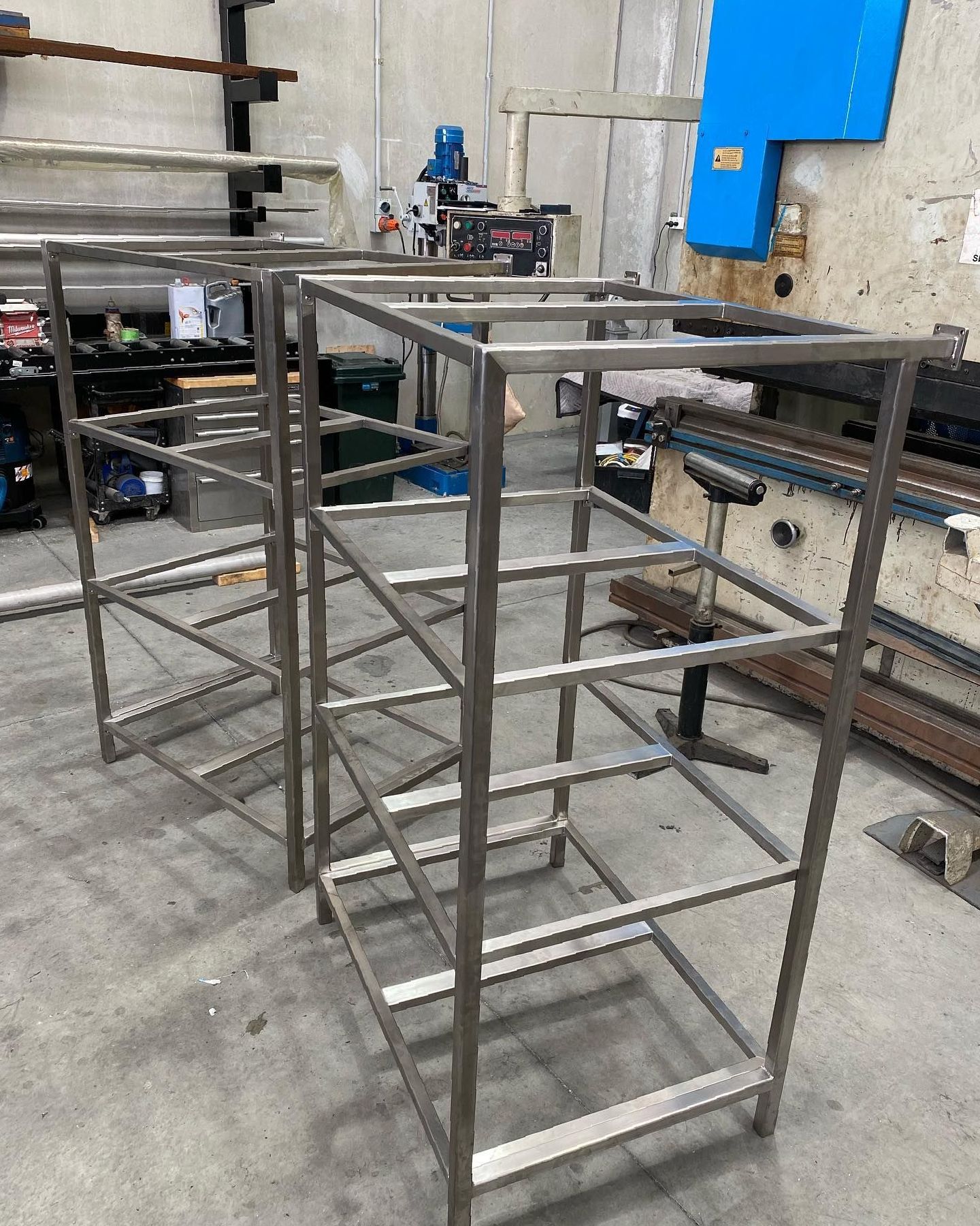 A Row of Stainless Steel Walls With a Lot of Windows in a Room — EB Metalworks in Somersby, NSW