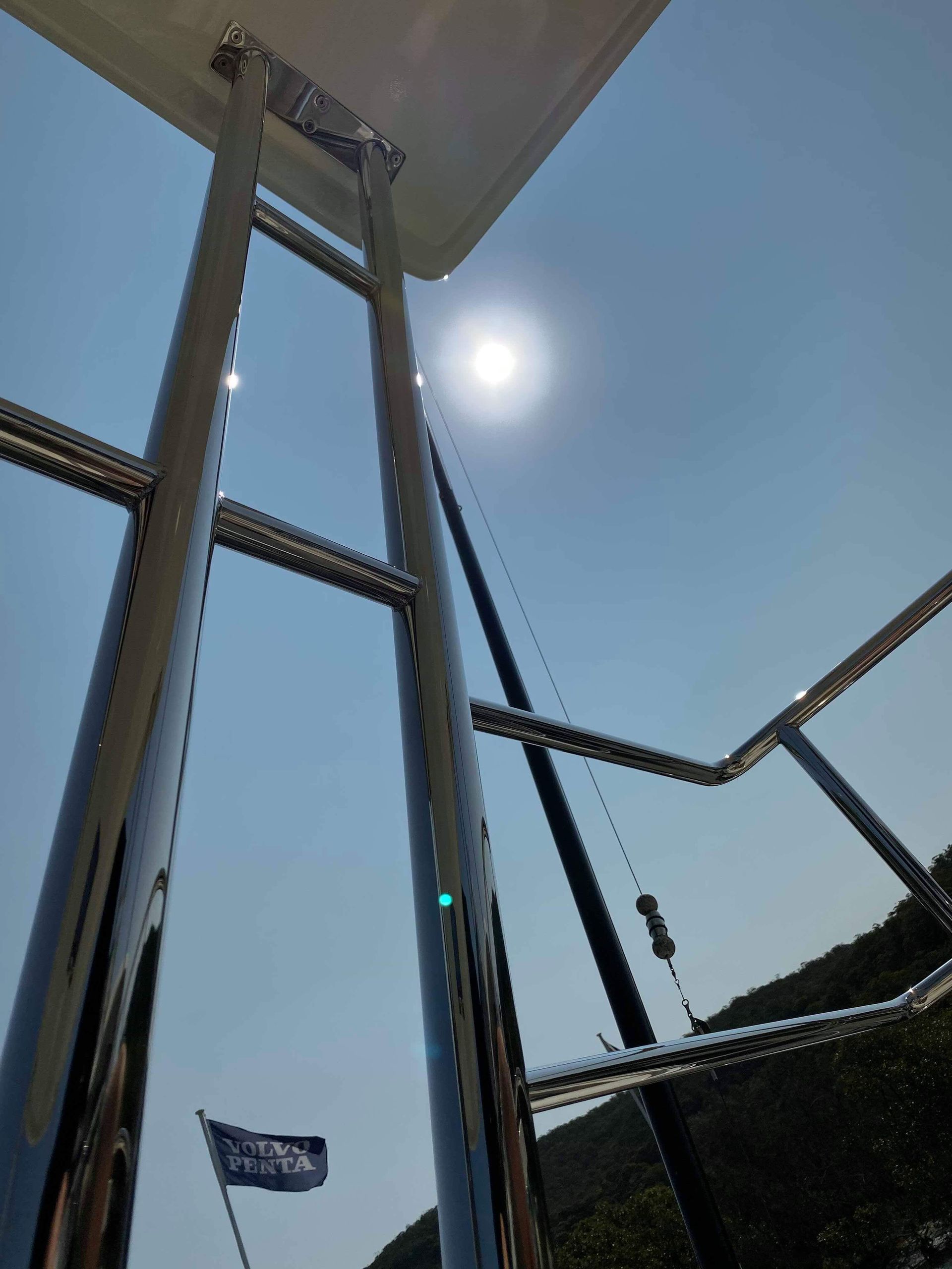 Looking Up at a Metal Structure With a Blue Sky in the Background — EB Metalworks in Somersby, NSW