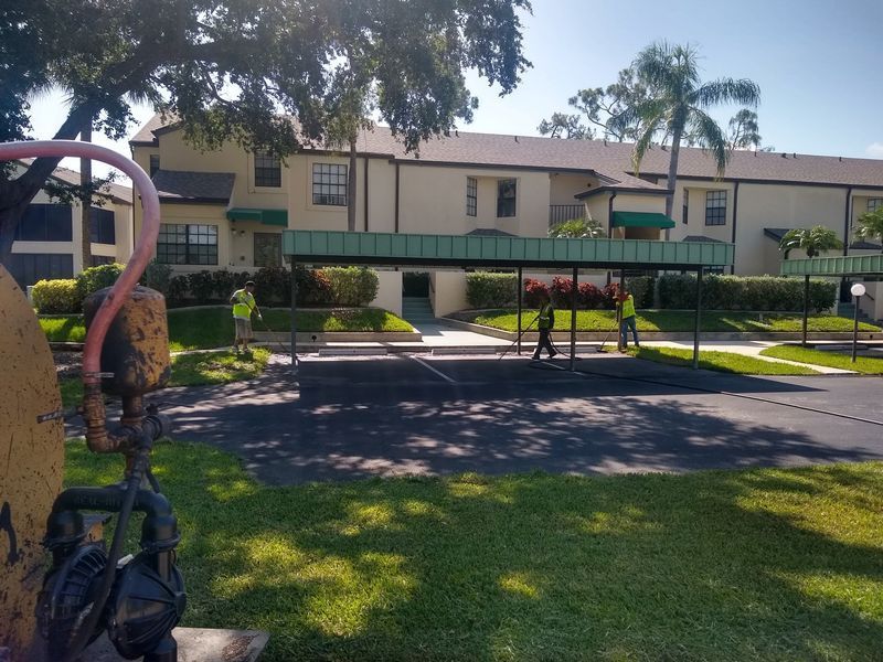 A building with a green awning on the side of it