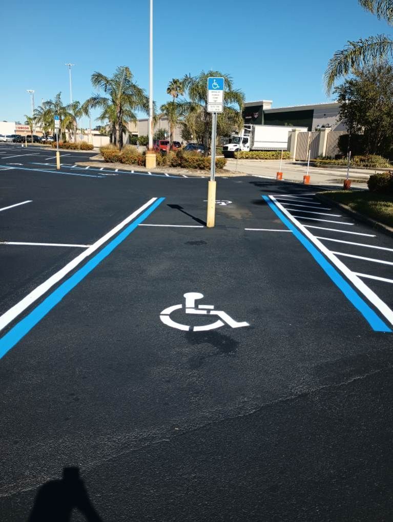 A handicapped parking spot in a parking lot