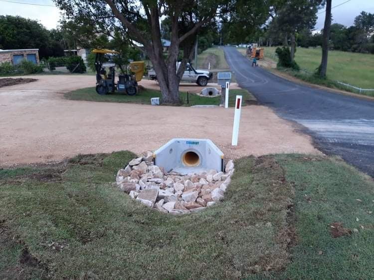 A White Truck Is Parked on The Side of The Road — CK's Milling & Earthworks in Pie Creek, QLD
