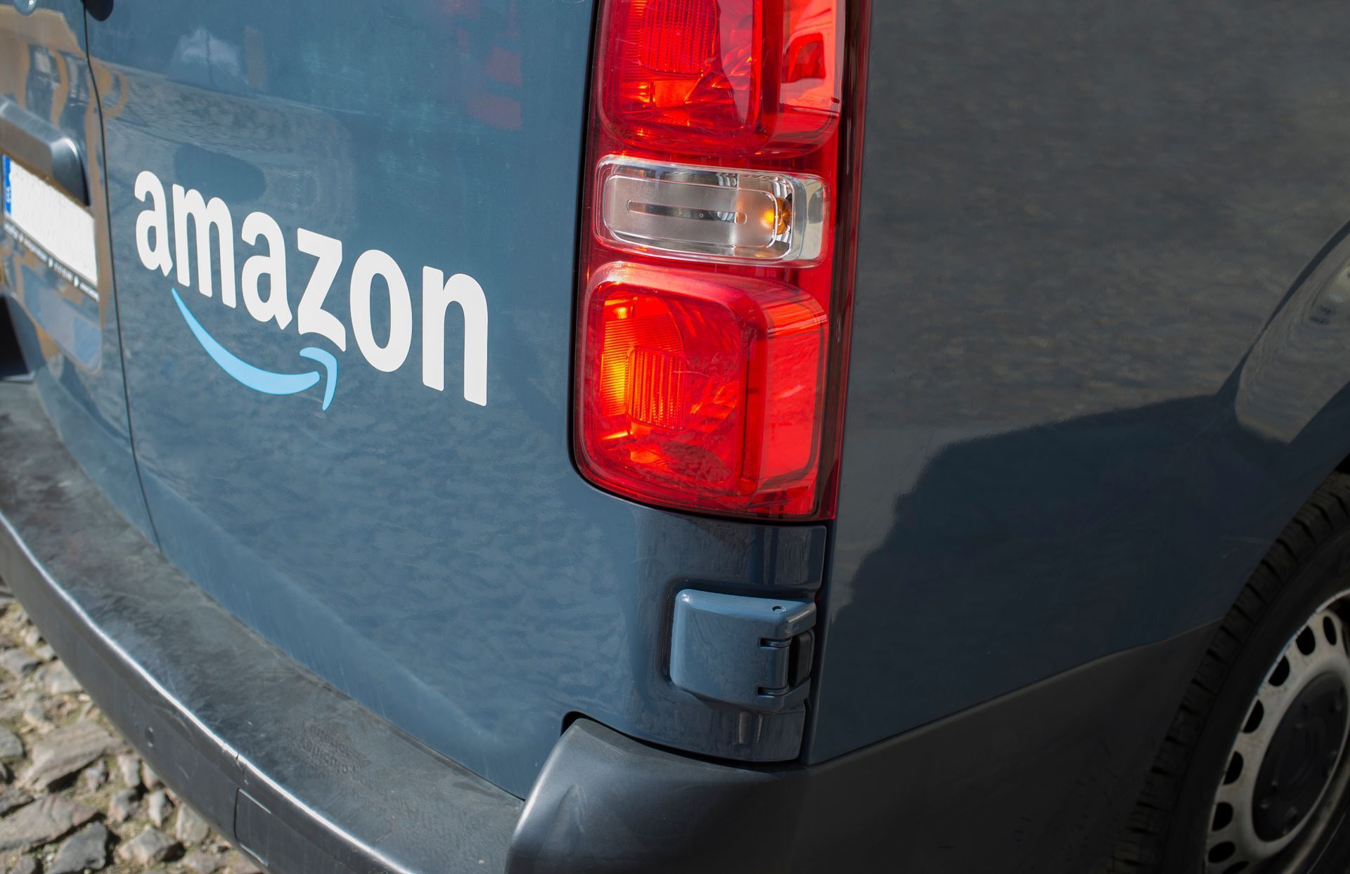gray van with the oi Amazon